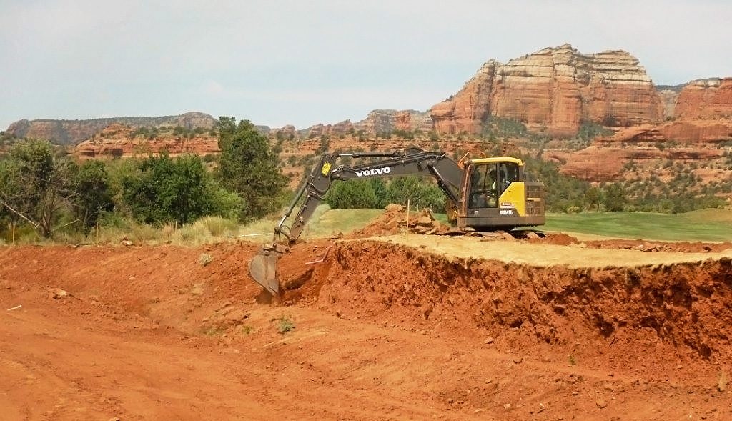 A backhoe digging