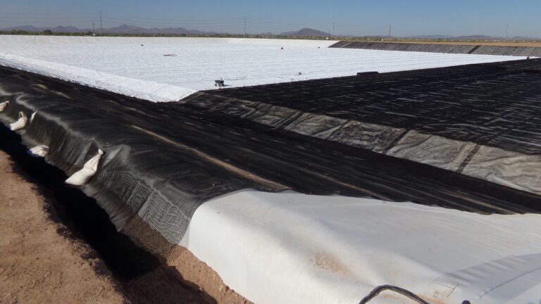 Completed empty evaporation pond with liner