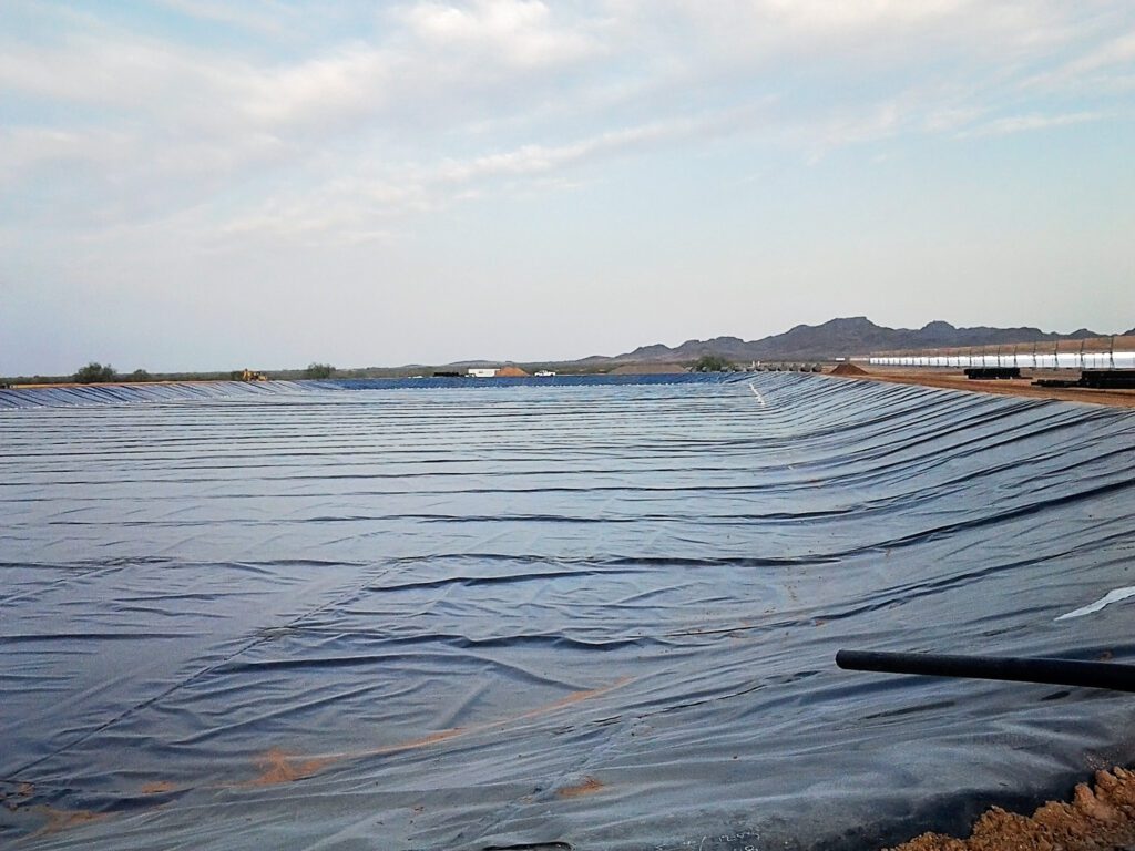 Empty completed evaporation pond with liner